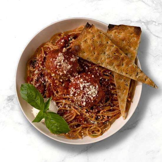 Spaghetti with meatballs, marinara sauce, parmesan, basil, ricotta, and garlic bread.