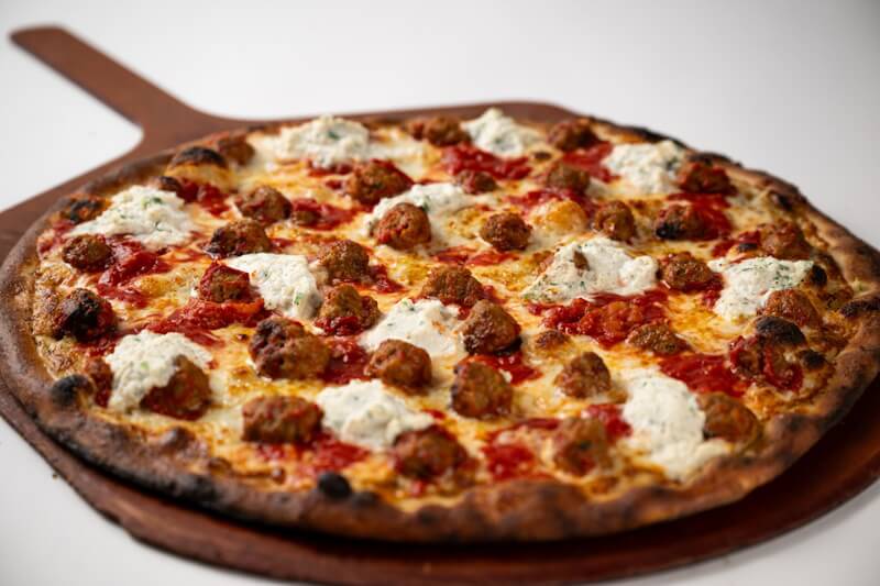 Meatball & Ricotta pizza from Anthony’s with savory toppings for a July 4th pizza party.